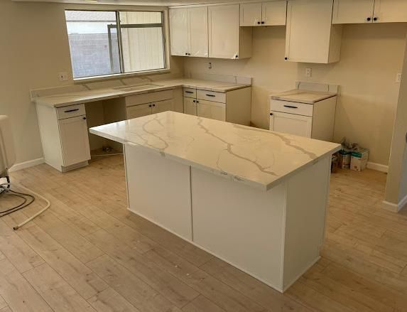Granite kitchen countertops white cabinets Las Vegas by Gurrola Tile