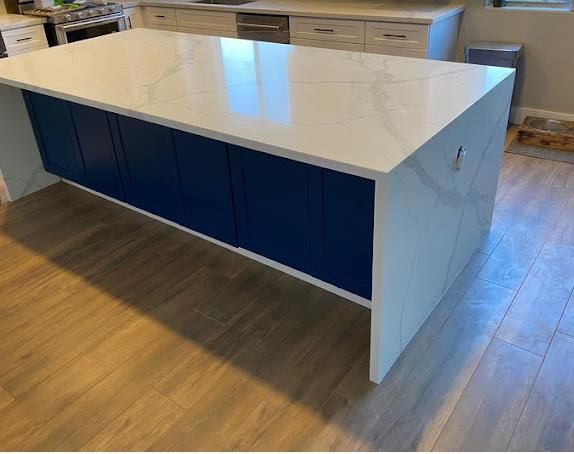 Waterfall granite edge island installation by Gurrola Tile Las Vegas